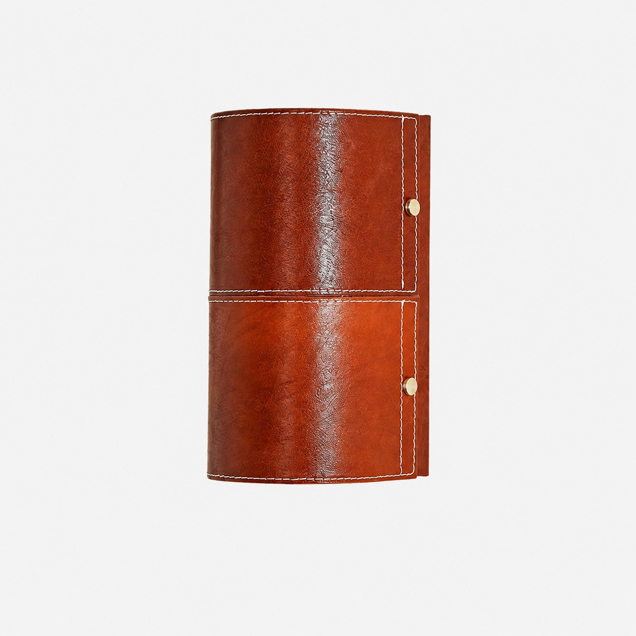 Brown leather wrapped cylinder wall sconce on clean background