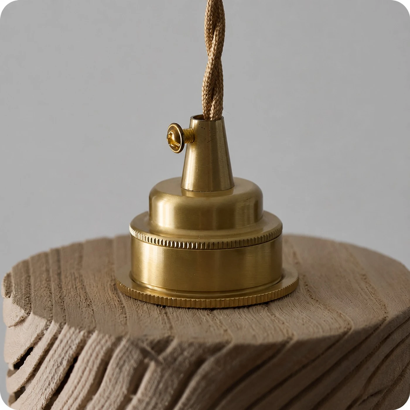 Brass canopy and woven cord detail