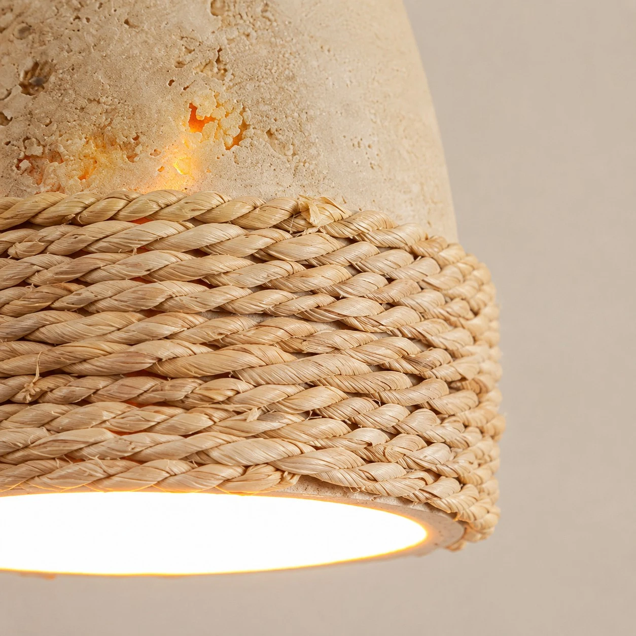Close-up of stone texture and woven lower band pendant detail