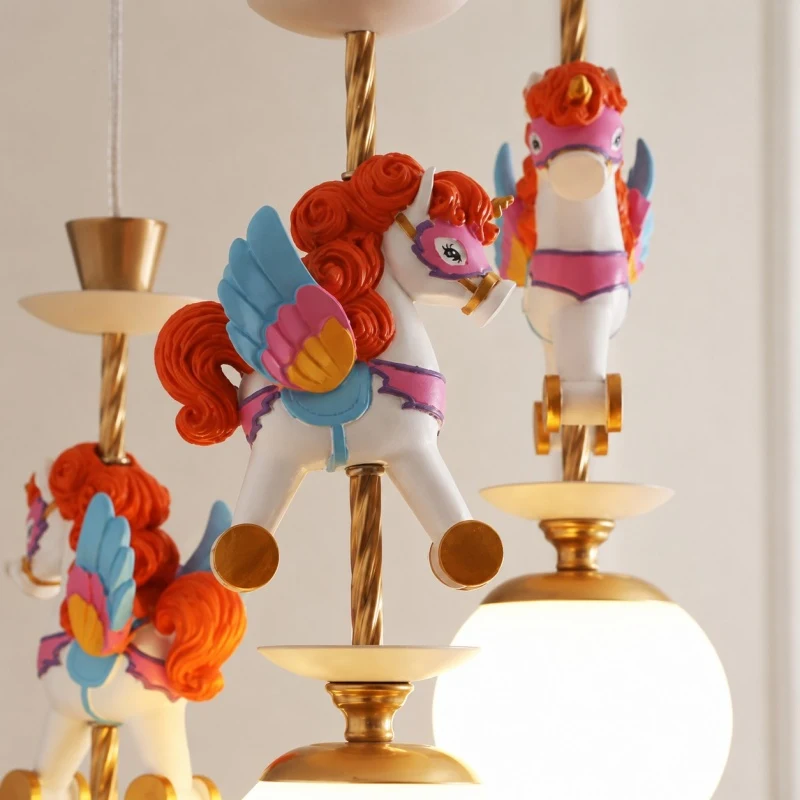 Close up of painted horse ornament and brass fixture detail