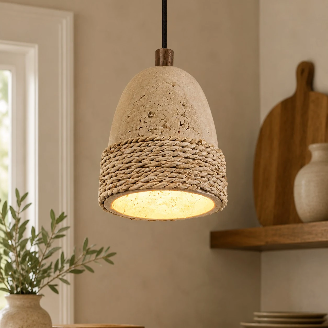 Warm glowing woven stone pendant light in a natural interior