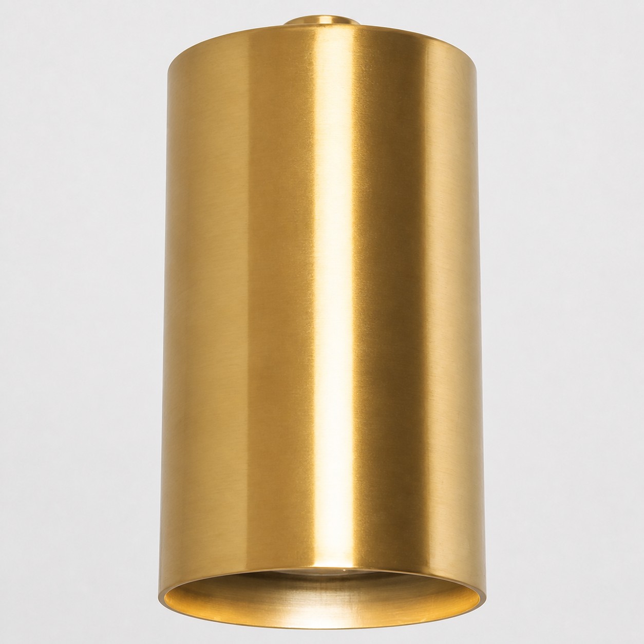 Brushed brass cylindrical shade detail